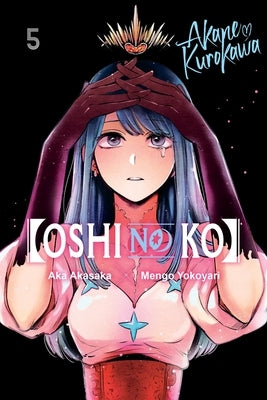 Paperback of Oshi No Ko, Volume 5 manga by Yen Press featuring colorful cover art and Japanese manga characters.